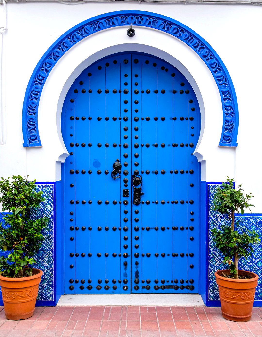 Heavy Iron Clavo Spanish Door - 24 Spanish Style Front Door Ideas
