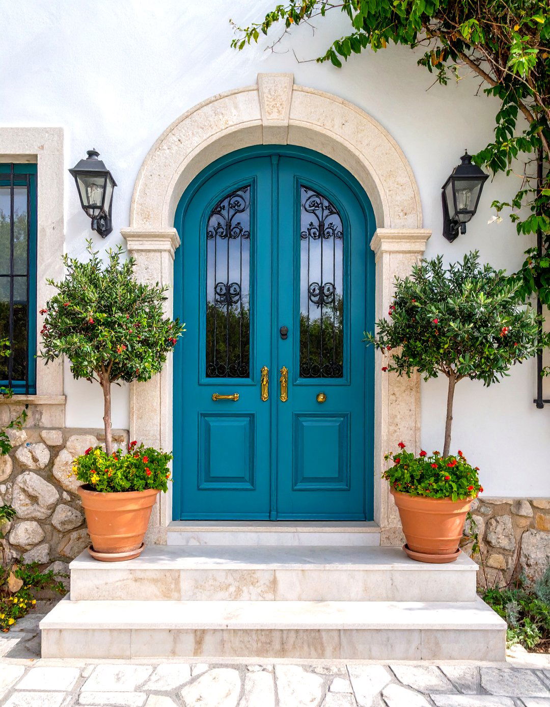 Mediterranean Turquoise Door with Terra Cotta Accents - 24 Turquoise Front Door Ideas