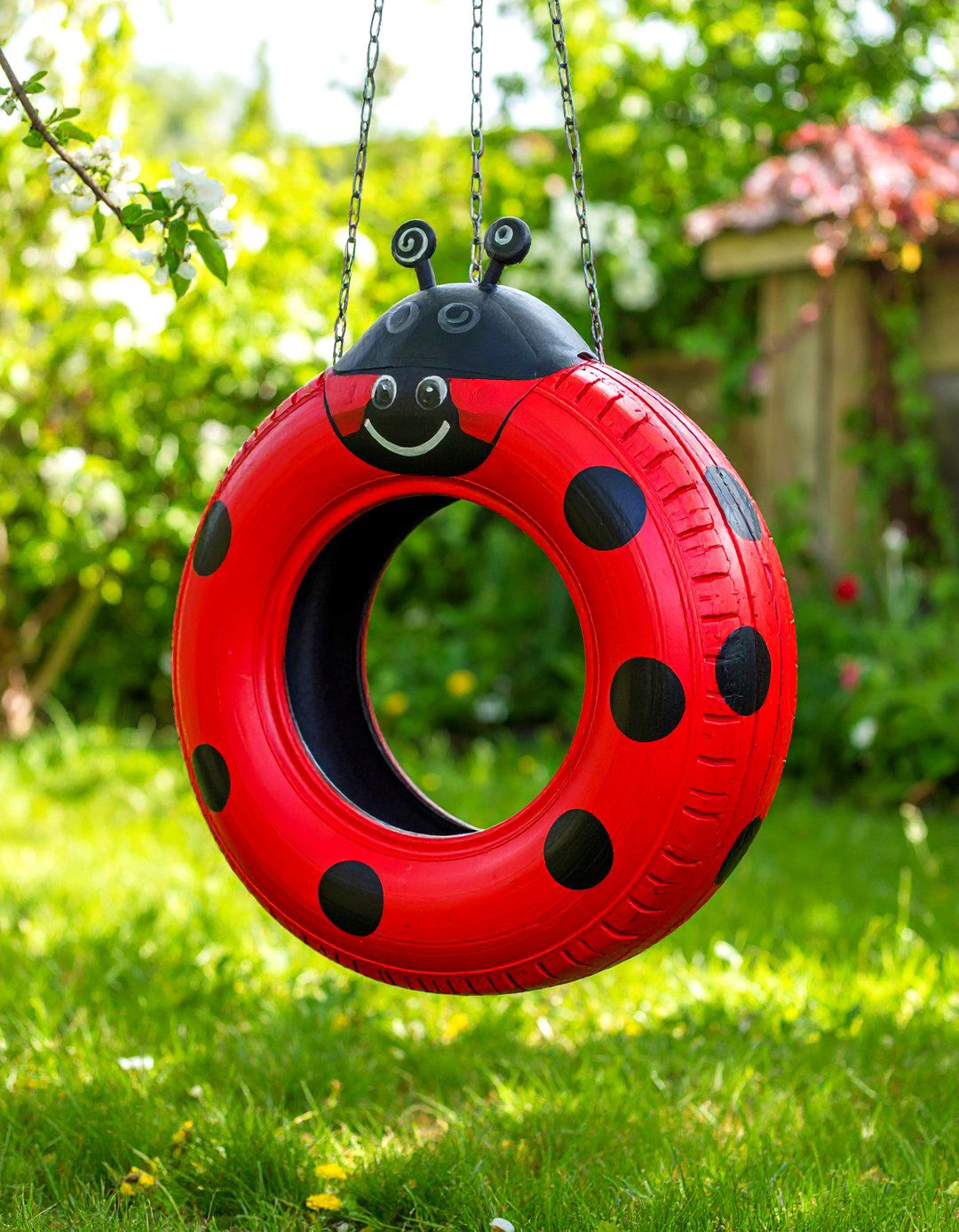 Painted Animal Character Tire Swing - 24 Tire Swing Ideas