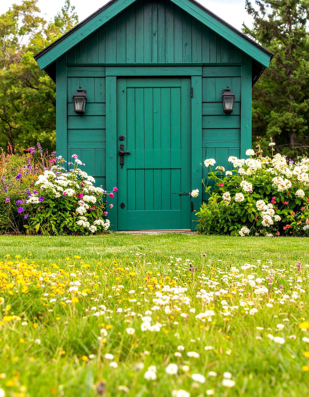 Rustic Barn Style Green with Antique Iron Hardware - 24 Dark Green Front Door Ideas