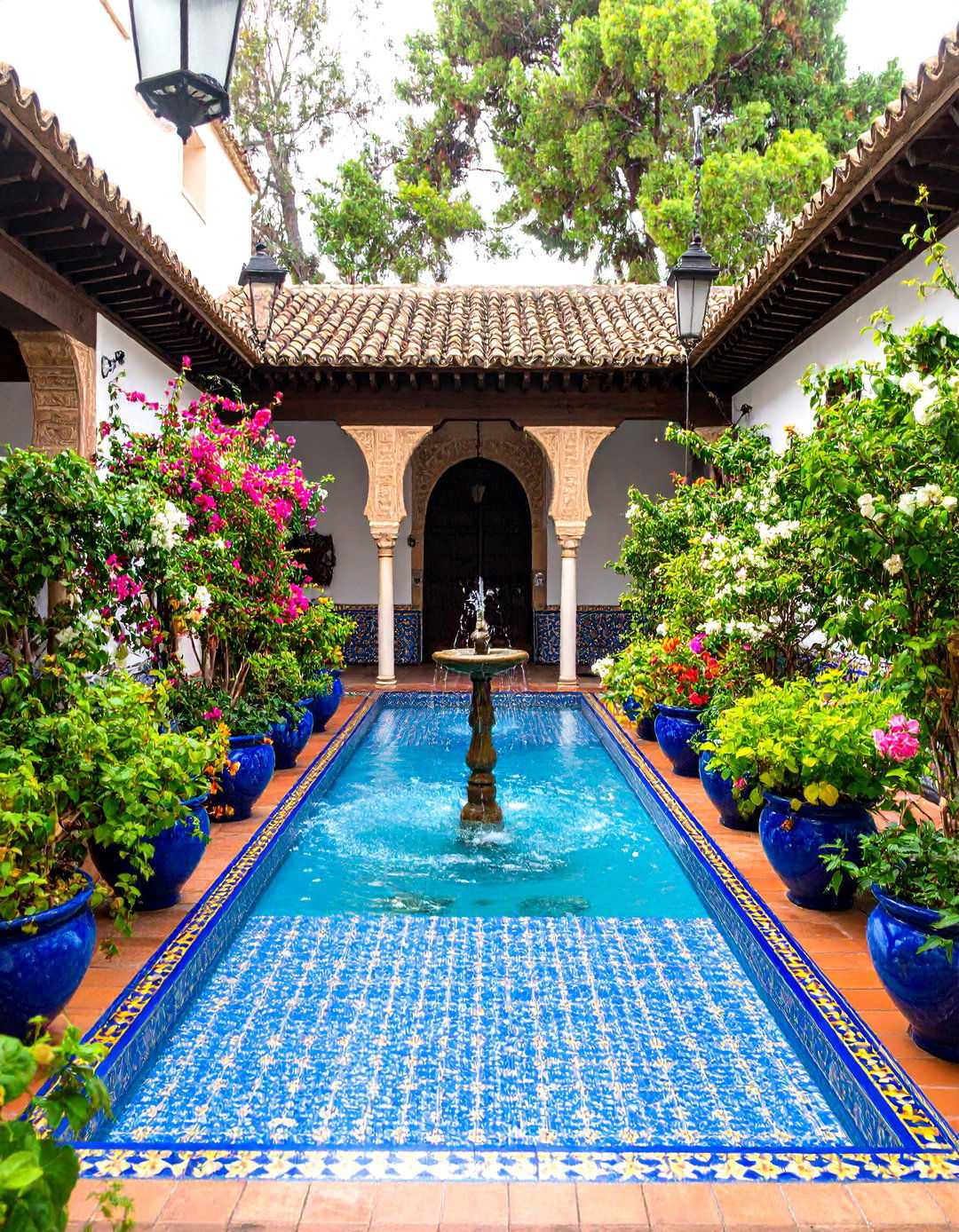Spanish Colonial Greenhouse Courtyard - 24 Greenhouse Room Ideas